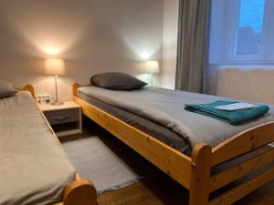Posteľ alebo postele v izbe v ubytovaní Appart O'key