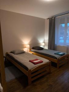 Posteľ alebo postele v izbe v ubytovaní Appart O'key