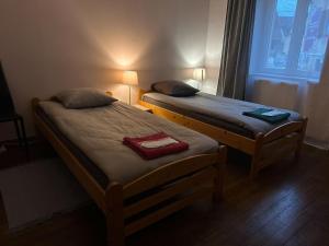 Posteľ alebo postele v izbe v ubytovaní Appart O'key