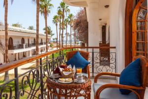 Un balcon sau o terasă la Seti Sharm Palm Beach Resort Families and couples only