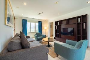 Uma área de estar em Radisson Blu Resort, Fujairah