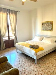 a bedroom with a large bed in a room at Casa Vacanza Sergio e Carla in Gioiella