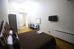 Pilot Baku hotel tesisinde bir odada yatak veya yataklar