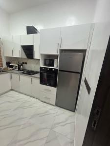 Kuchyň nebo kuchyňský kout v ubytování Exquisite 3 Bed