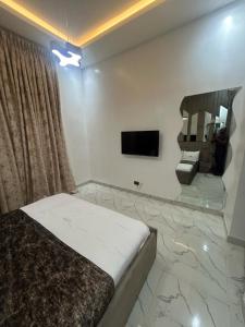 TV a/nebo společenská místnost v ubytování Exquisite 3 Bed