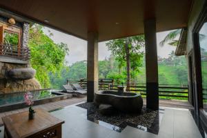 Posezení v ubytování Ubud Paras Villa