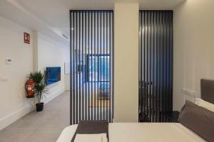 Ένα ή περισσότερα κρεβάτια σε δωμάτιο στο Apartamento Presidente 4