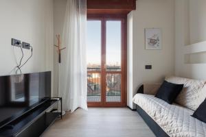 Telewizja i/lub zestaw kina domowego w obiekcie Milano Renovated Studio APTS
