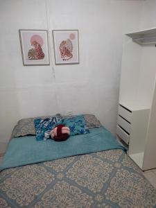 Кровать или кровати в номере Casa a poucos passos do Museu da Amazônia