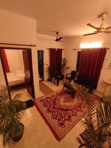A bed or beds in a room at SAND BEACH HOUSE VARKALA