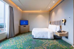 Holiday Inn Katra Vaishno Devi by IHG客房内的一张或多张床位