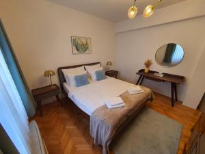 En eller flere senge i et værelse på Apartments Dvor - ap4, ap5, ap6