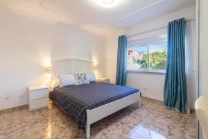 Postel nebo postele na pokoji v ubytování Flatguest Sonneland Suite