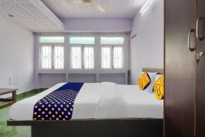 Posteľ alebo postele v izbe v ubytovaní SPOT ON Apsara Hotel