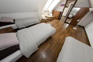 Posteľ alebo postele v izbe v ubytovaní Villa Hof