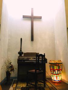 a church with a cross and a piano and a cross at Hakone Mori No Yado in Hakone