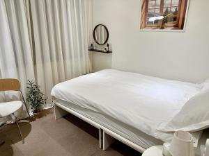 Voodi või voodid majutusasutuse SSH Ikseon peter cat Hostel toas