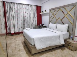 Voodi või voodid majutusasutuse Premium Apartment in Hiranandani Powai by Maxxvalue - Chitranjan toas