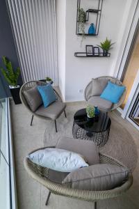 Posezení v ubytování Melody Apartment + 21 fotografií