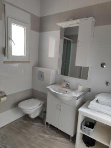 Ванная комната в Apartmani Seka