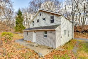a small white house with a roof at Updated Minersville Townhome by ATV Trail! in Mount Pleasant