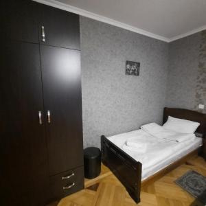 A bed or beds in a room at GIO-NIKA
