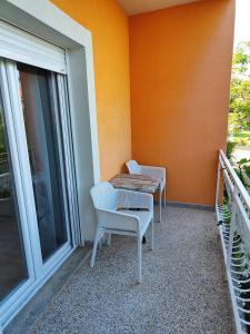 Балкон или терраса в Apartmani Seka