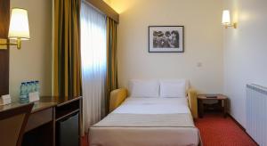 Postel nebo postele na pokoji v ubytování Hotel Sao Jose