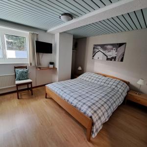 Postel nebo postele na pokoji v ubytování B&B Chalet Rustica Inden, Leukerbad