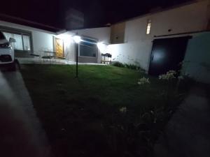 Taman di luar La Laguna - Casa familiar a 5 cuadras de la playa.