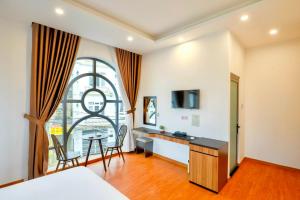 Postel nebo postele na pokoji v ubytování TTR Midtown View Hotel