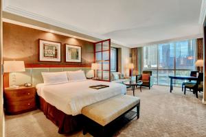 Postelja oz. postelje v sobi nastanitve Strip View Suites - No Resort Fee !