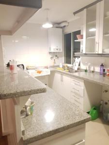 Kuchyň nebo kuchyňský kout v ubytování Penthouses Rocas de Santo Domingo Barrio Golf