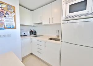 Kuchyň nebo kuchyňský kout v ubytování Skol 302 Super One-bedroom Duplex with Sea Views + 18 fotografií