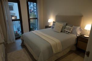 Un pat sau paturi într-o cameră la Apartamento en Moraira