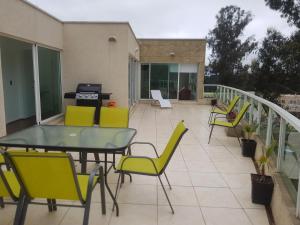 Balkón nebo terasa v ubytování Penthouses Rocas de Santo Domingo Barrio Golf