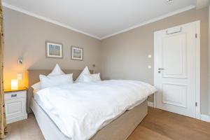 Ein Bett oder Betten in einem Zimmer der Unterkunft Alva 1