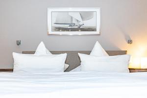 Ein Bett oder Betten in einem Zimmer der Unterkunft Alva 1