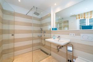 Ein Badezimmer in der Unterkunft Alva 1