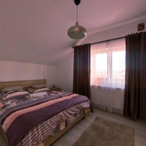 Postel nebo postele na pokoji v ubytování Casa Reds