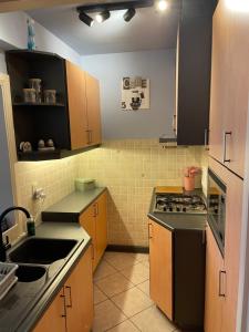 A cozinha ou kitchenette de Zeezicht Studio Delphine