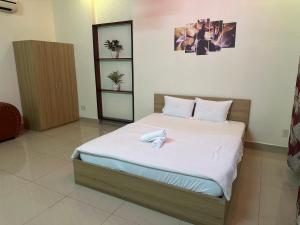 Postel nebo postele na pokoji v ubytování 158A Hotel