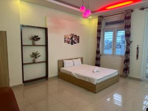 Postel nebo postele na pokoji v ubytování 158A Hotel