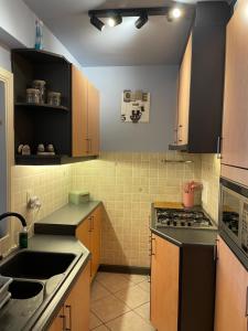 A cozinha ou kitchenette de Zeezicht Studio Delphine