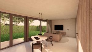 a living room with a table and chairs and a television at Woodz Lodges in Heusden - Zolder