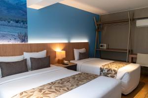 Postel nebo postele na pokoji v ubytování Hotel El Tambo 2