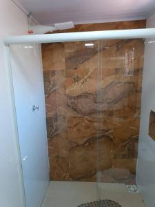 Koupelna v ubytování Quitinete do Amorim 2 + 7 fotografií