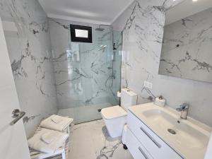 Ванная комната в Las Norias Apartamentos & Grill