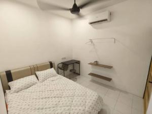 a white bedroom with a bed and a fan at Roomstay Bilik shj Alor Setar Derga Jaya 10mins to Aman Central in Alor Setar