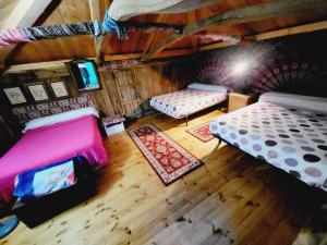 an overhead view of a bedroom with two beds at Casa Verde. in Villaviciosa